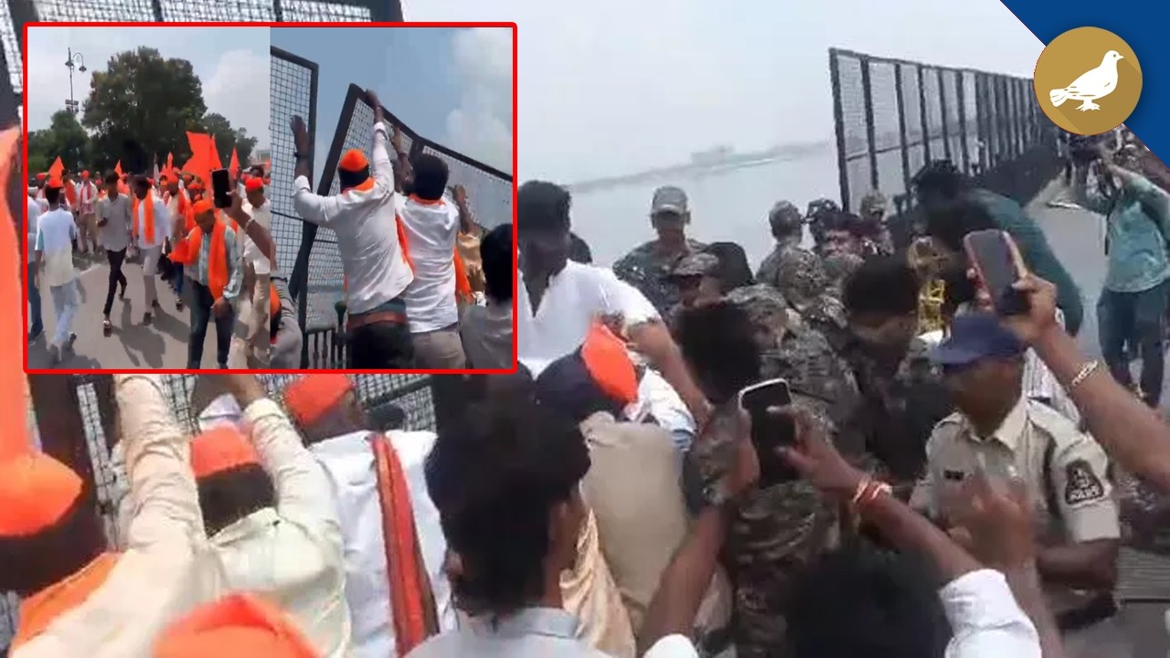 Mild tension at Tankbund, Ganesh utsav samithi members remove barricades, Detained