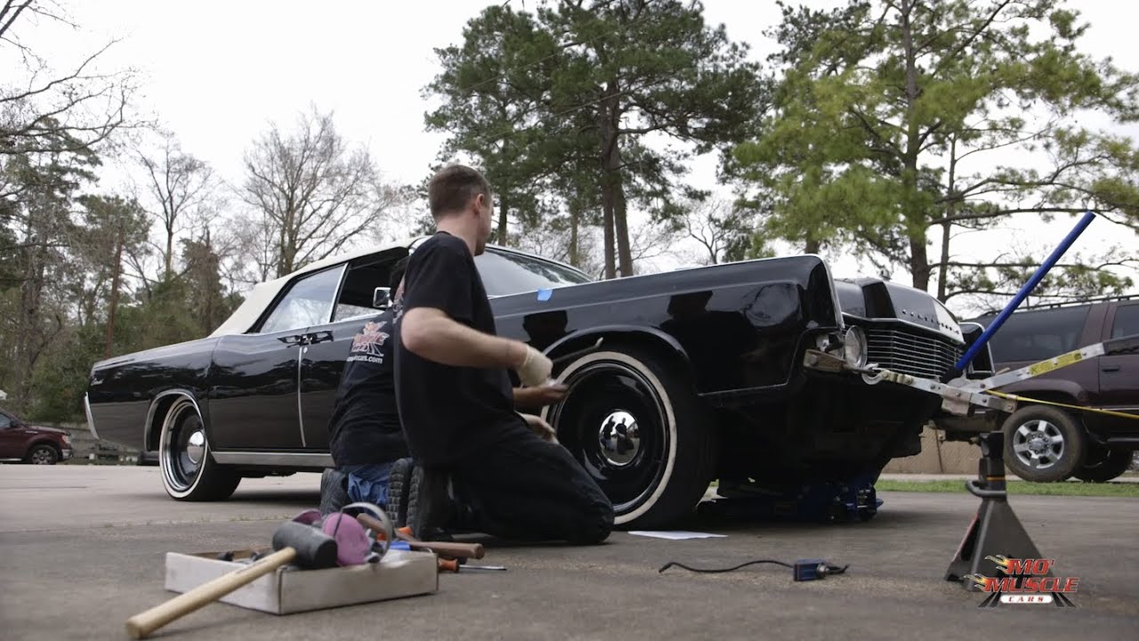 Fixing a dent on the 1966 Continental