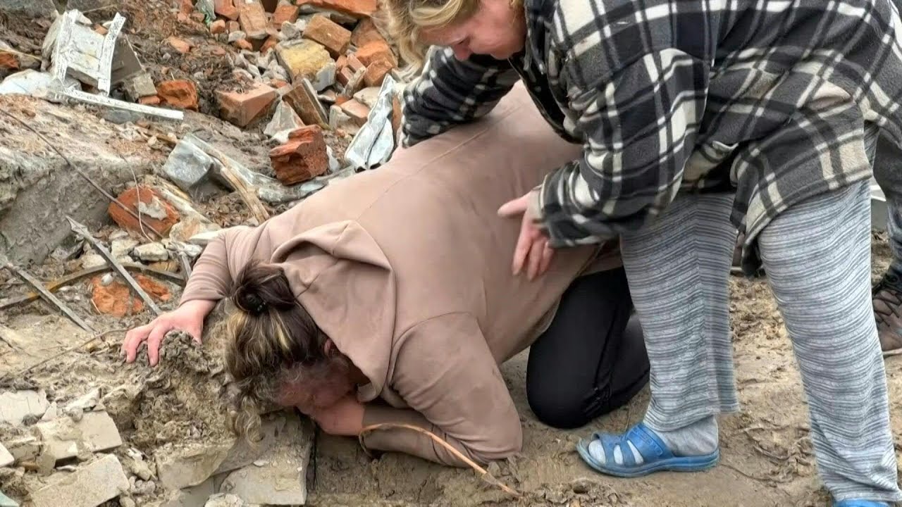 Ukrainische Mutter findet Leiche ihres Sohnes in einem Loch | AFP