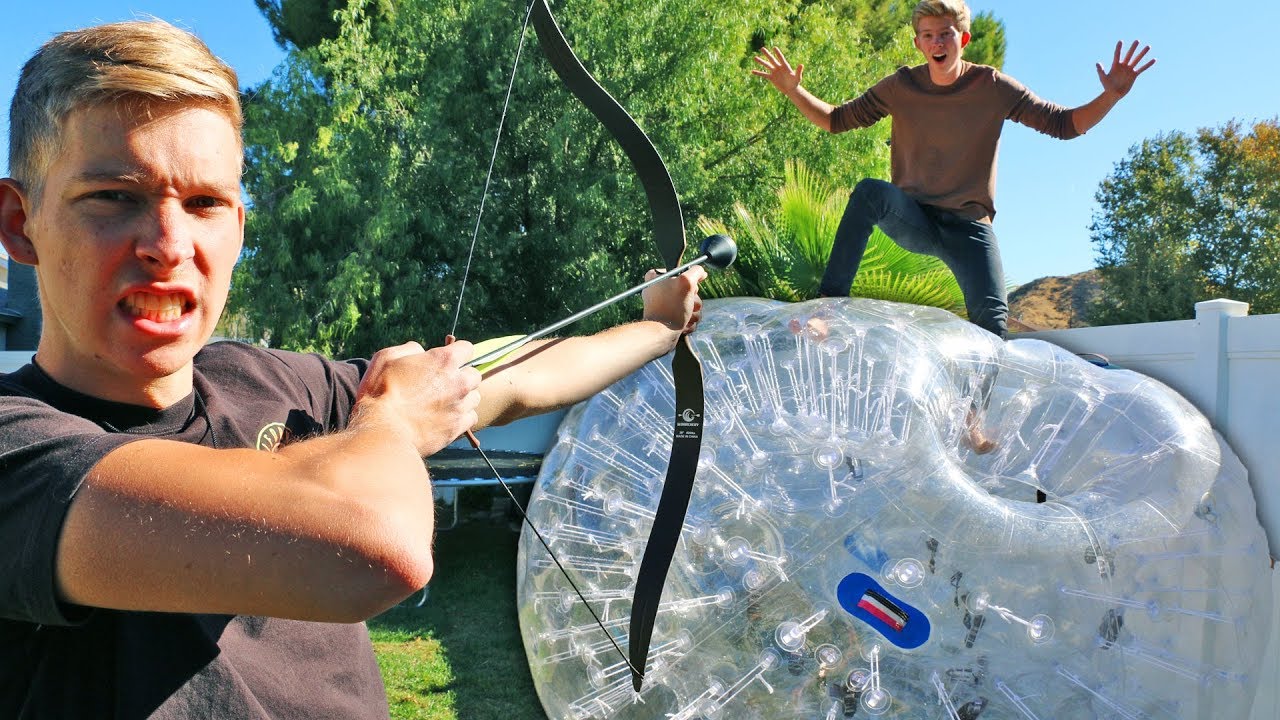 Shoot the Person off the GIANT Inflatable Zorb Ball!!