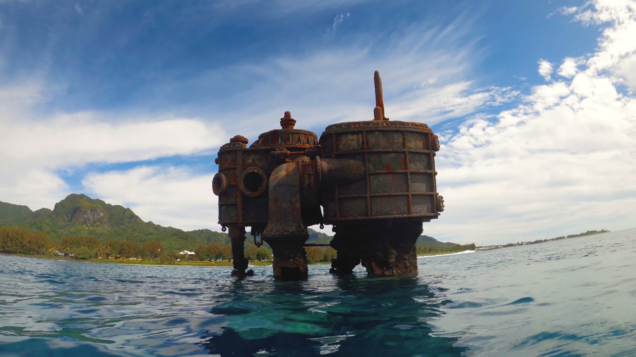 snorkeling at the boiler from the wreck in Rarotonga Cook Islands swim snorkel dive sites