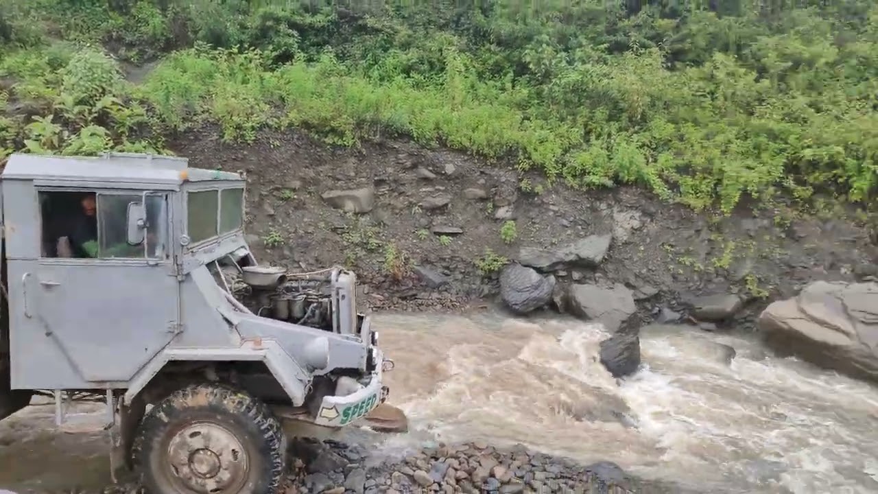 SHAKTIMAN vehicle 4x4 off-road in river.