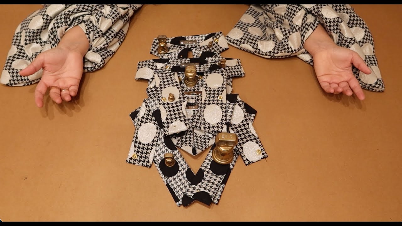 BOW TIED: 6 VARIATIONS OF BOWS DISPLAYED ON A TABLE