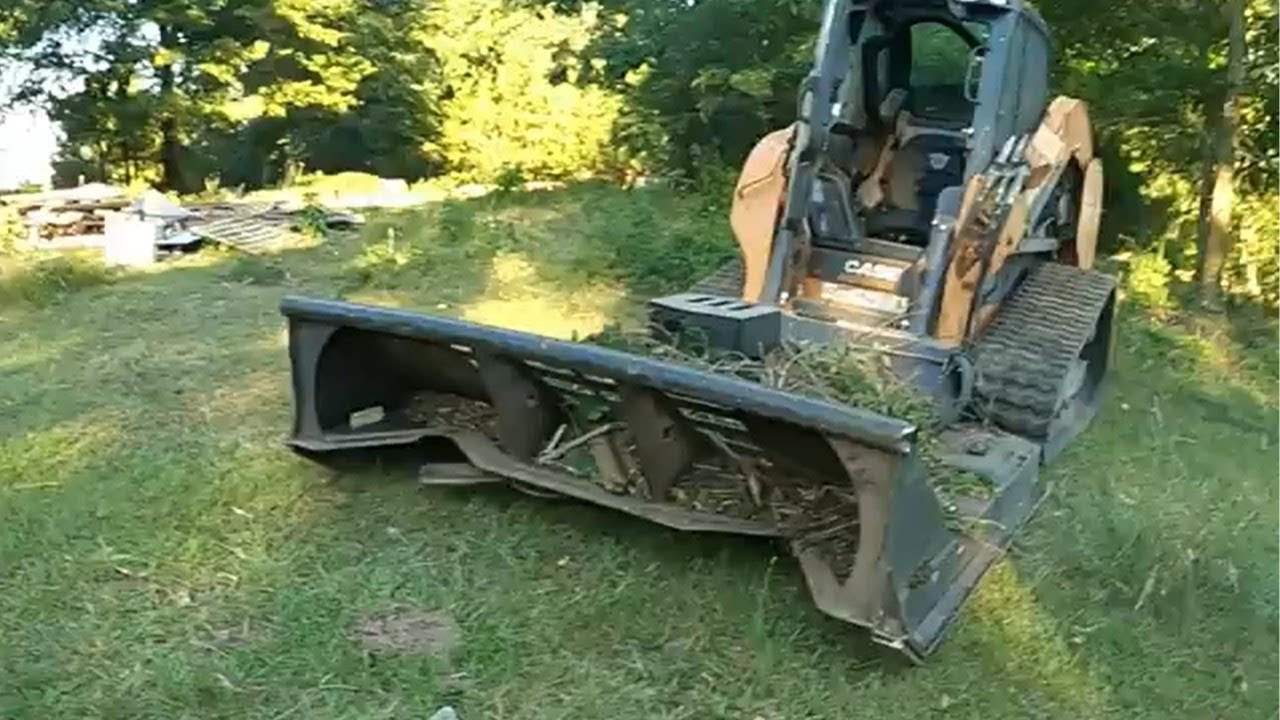 SKID-STEER FORESTRY TOOL DESTROYING overgrown fence line/ Reclaiming our property