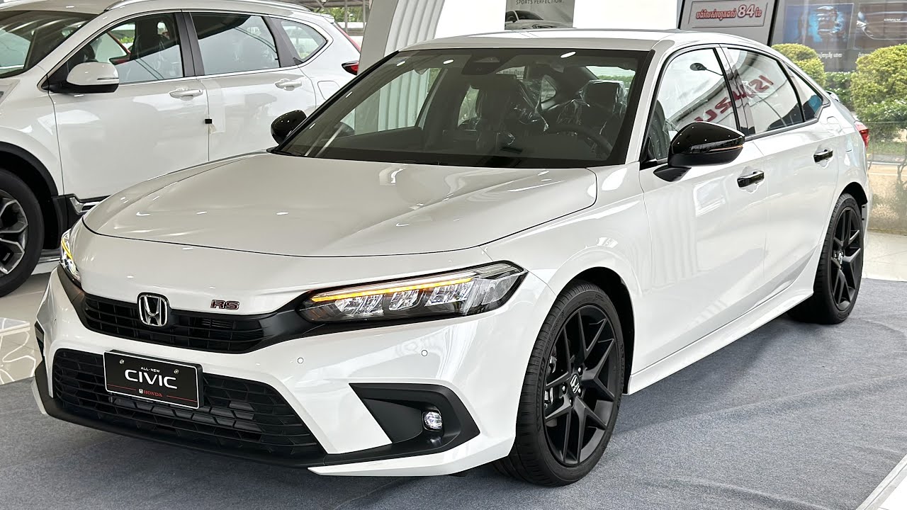 The New 2023 Honda Civic RS White - Full Option Sedan
