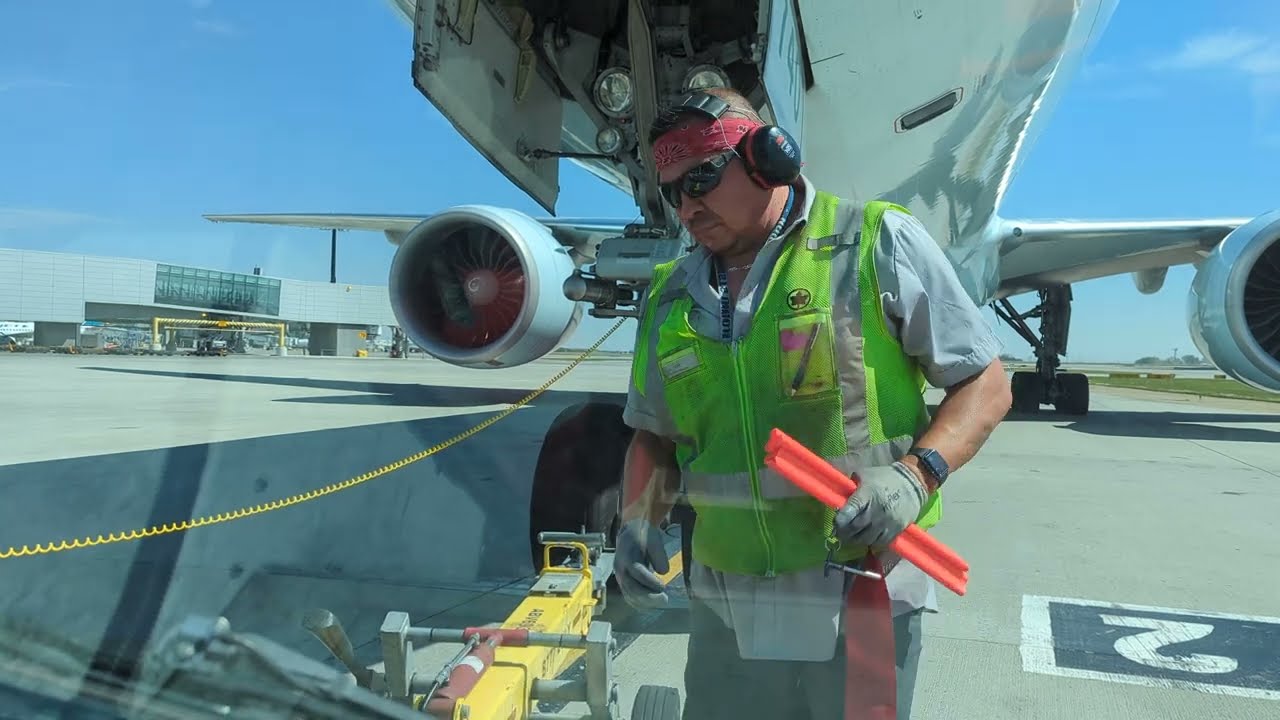 Right on the Money!  Boeing 777-300ER Pushback YYC