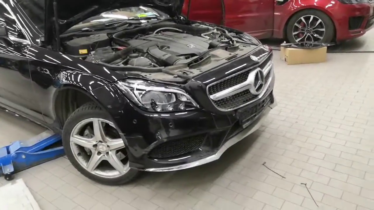 Мерседес бенз С 218 CLS 2015 года снятие переднего бампера