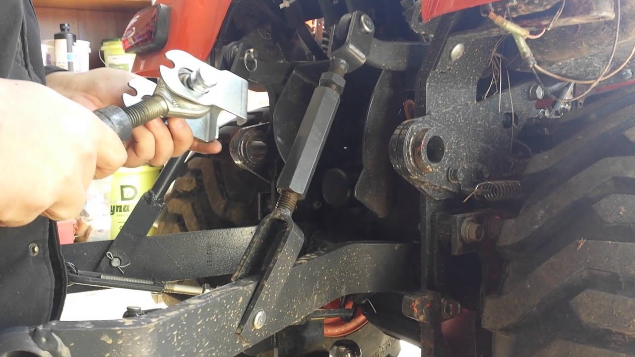 Putting 3 pt hitch hardware on Kubota BX25D