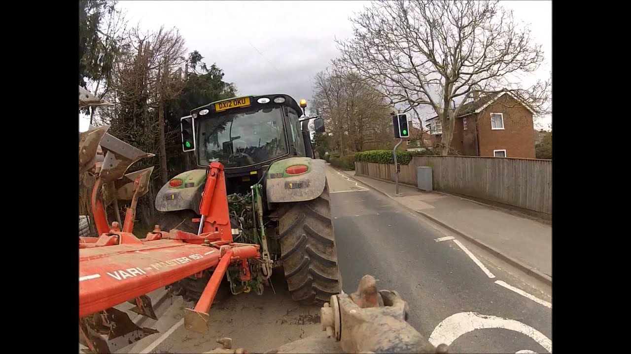 taking the plough through town