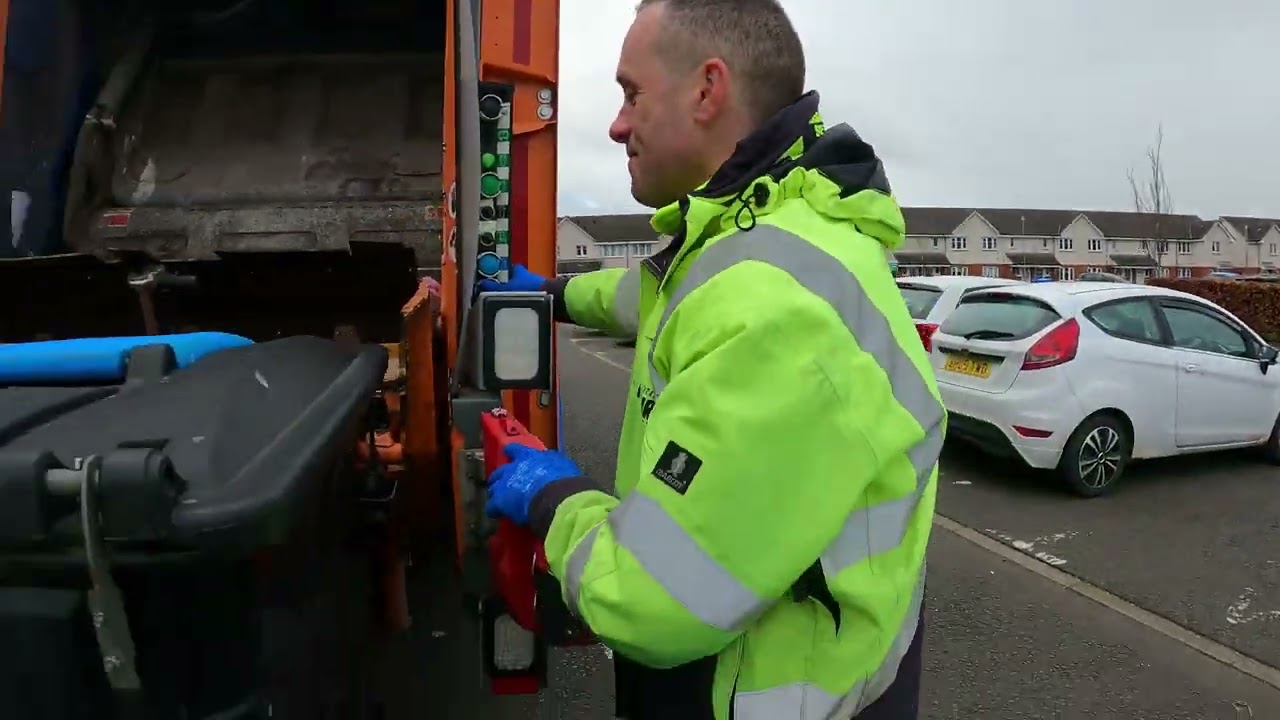 Garbage Truck Driver on Blue Recycle Bins in Sunny Scotland!