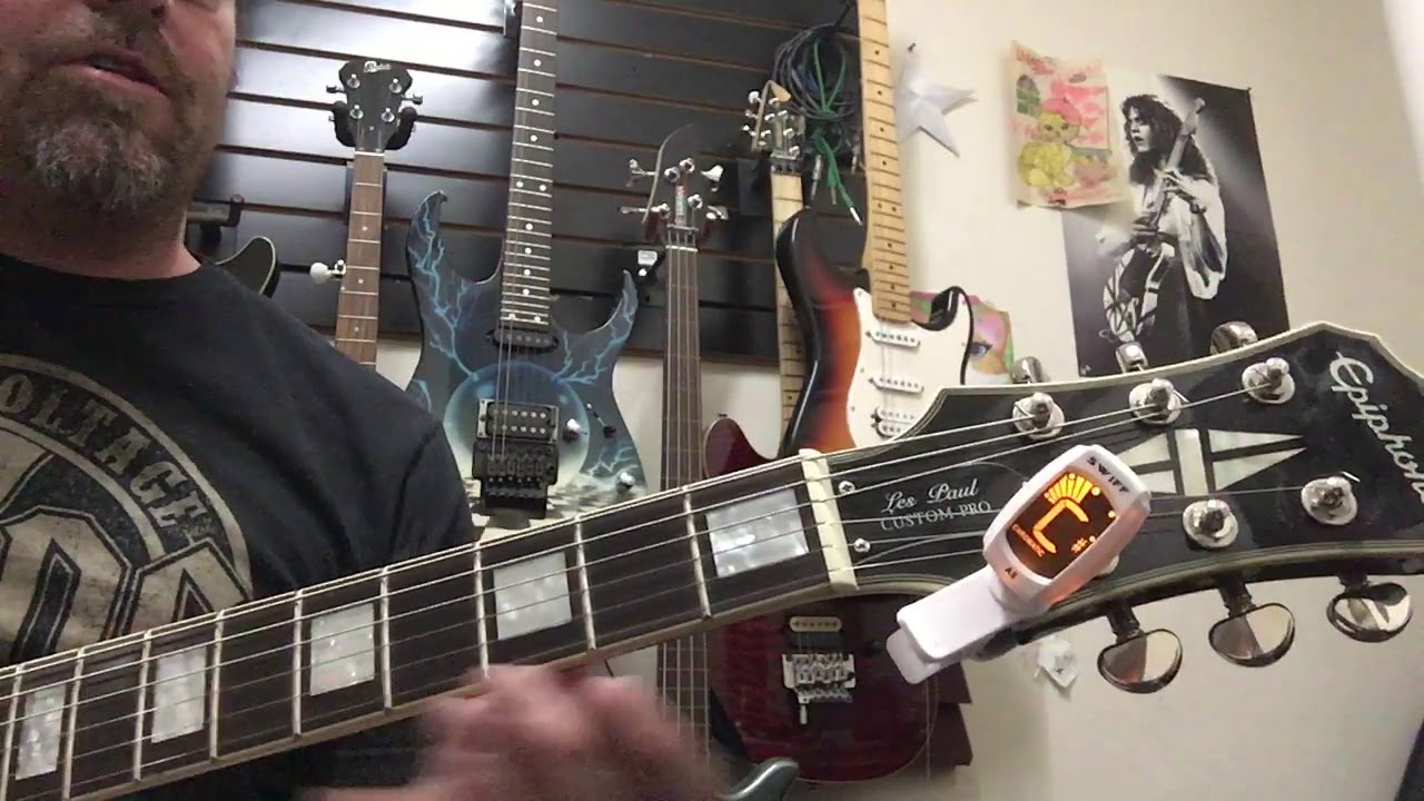 How to tune the guitar down a whole step