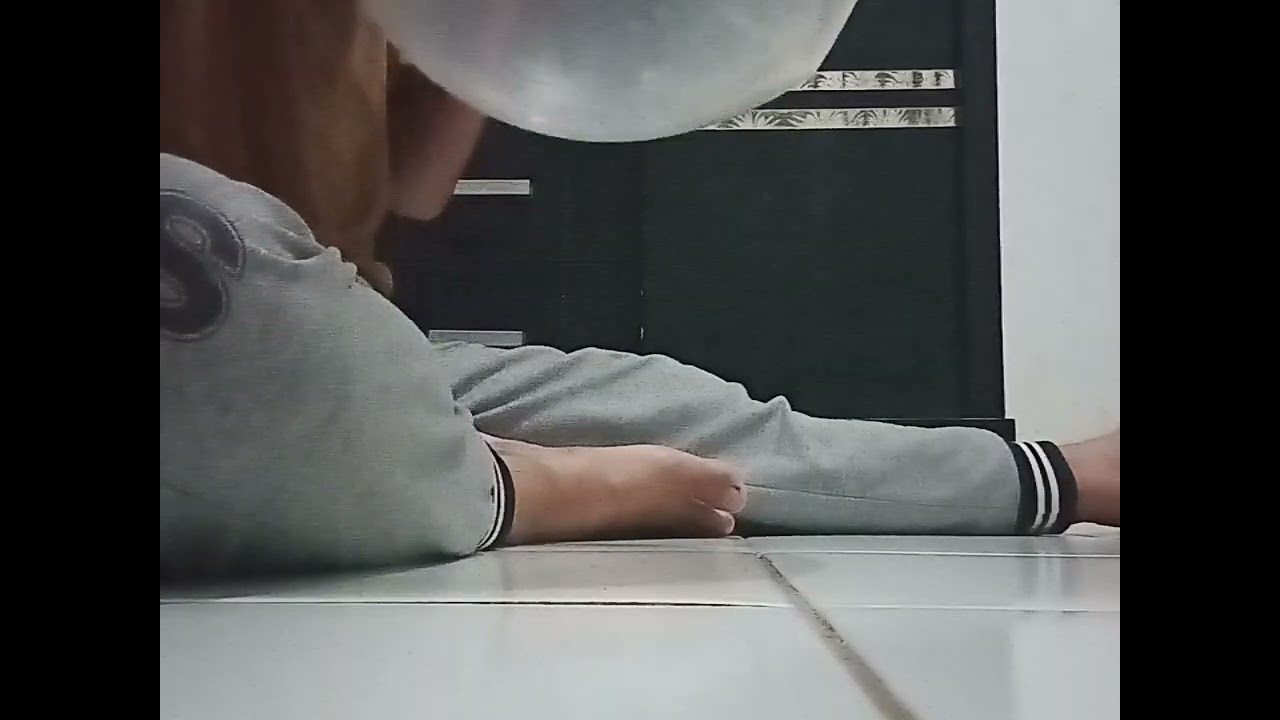 Tiup Balon PVC Bekas (Blowing a Used  PVC Balloon)