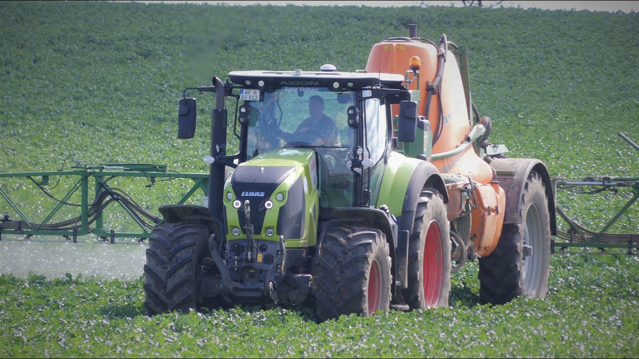 Spritzen mit Claas Axion 810 und Amazone UX 6200