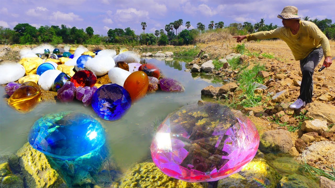 The golden thread of creation! Columns of colorful diamonds grow on the lake, gems, diamonds, gold.
