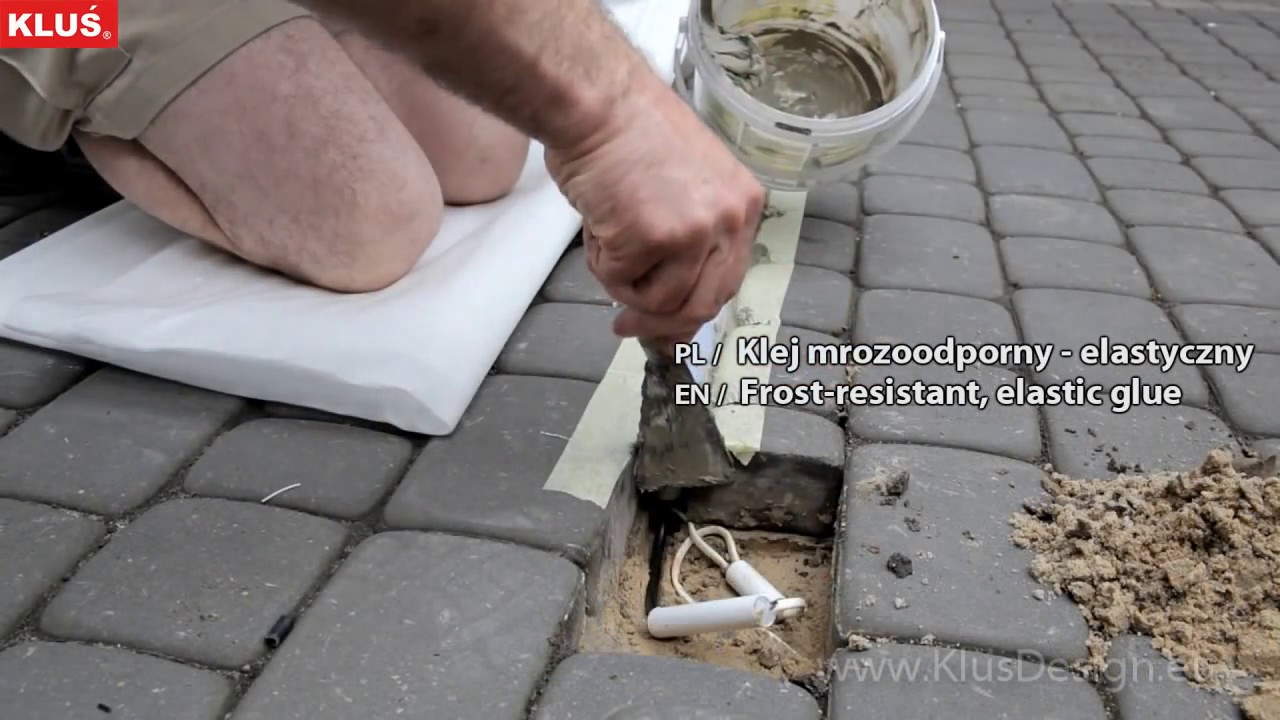 KLUS Design - Oświetlenie podjazdu na bazie profilu HR-LINE. Montaż w kostce brukowej.