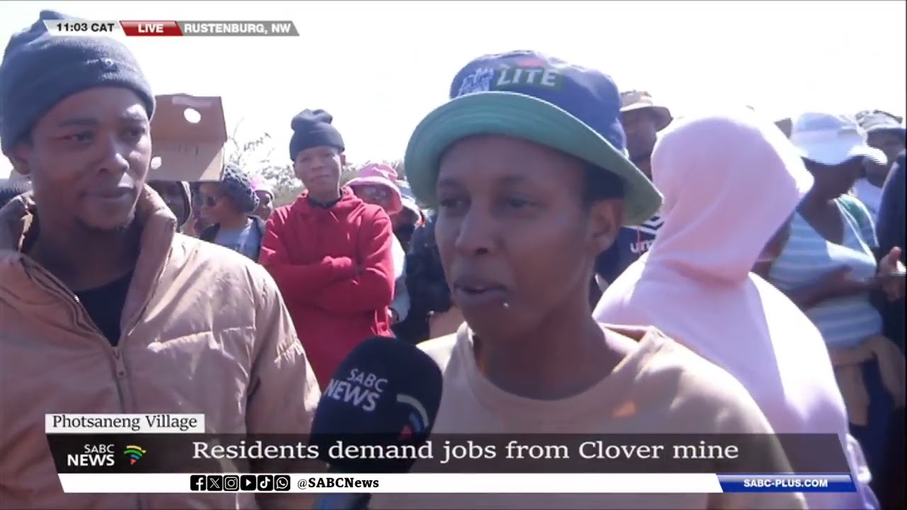 Photsaneng Village residents march to the Clover mining operation