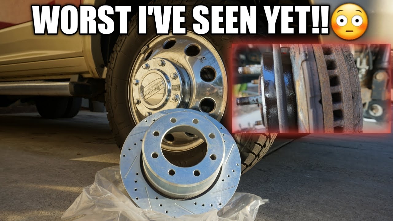 HOW TO CHANGE FRONT BRAKE ROTORS & PADS RAM 3500 DRW