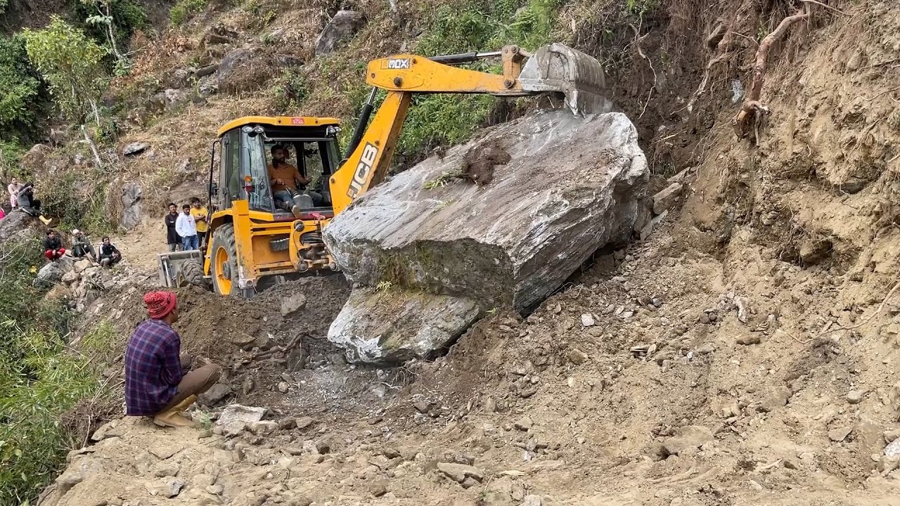 Massive Rock Could not Stop Rocky Mountain Road Construction