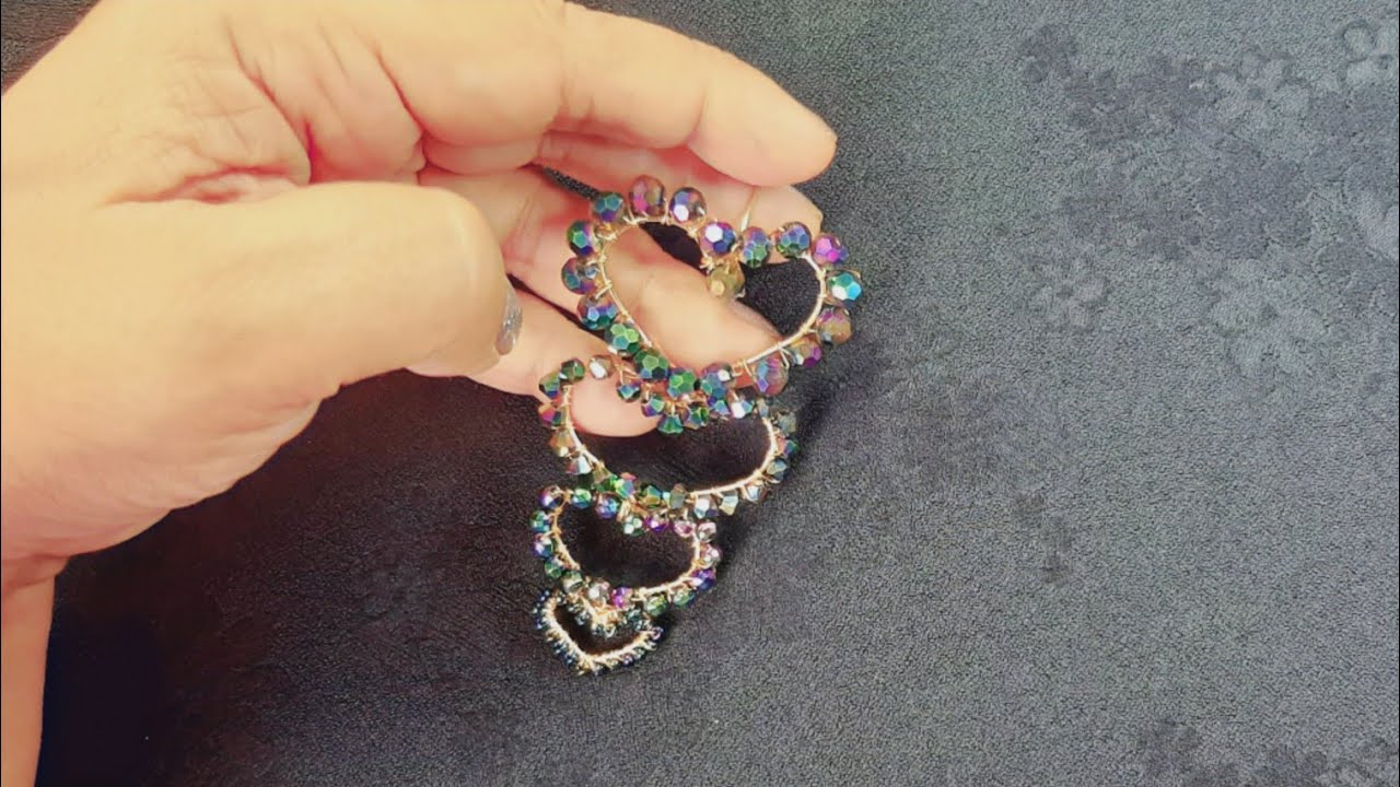 Aretes realizados con la técnica de alambrismo