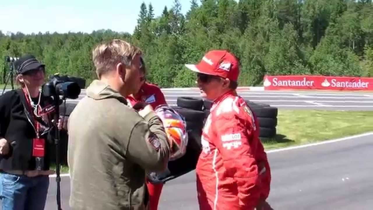 Kimi Raikkonen chatting with Henning Solberg