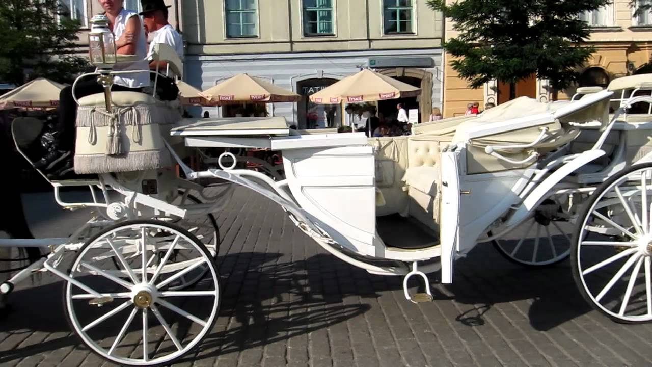 Dorozki przy Krakowskim Ryku / Horse driven carriage at Krakow's Market Square