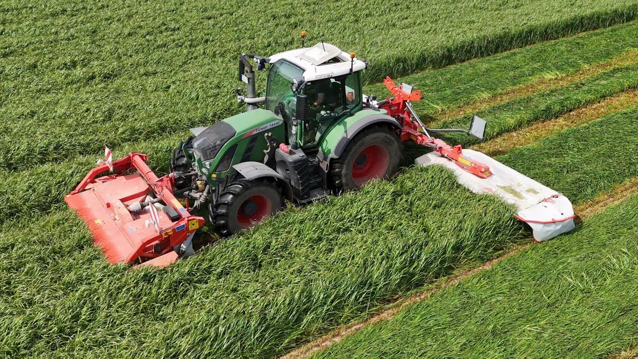 FENDT 724 mit eine KUHN GMD 8730 Mähkombi am Gras mähen / 4K