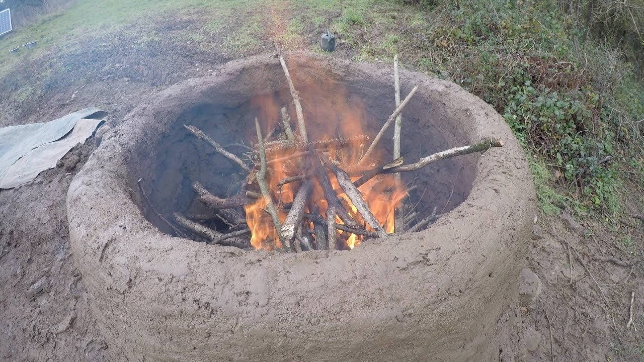 Making a primitive lime burning kiln
