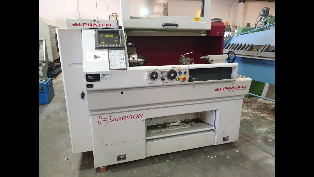 Checking for any noticeable bed wear on a Harrison Alpha 330 Plus CNC Teach Lathe
