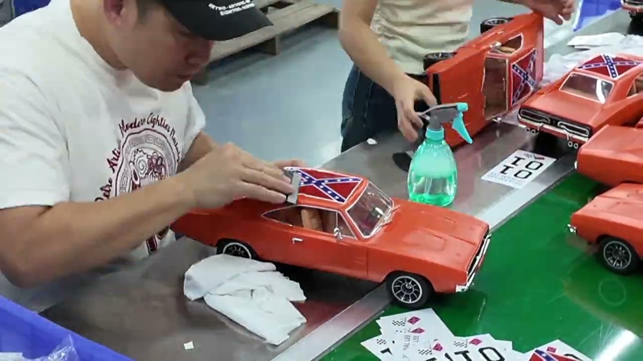Video on repeat or actual time lapsed on sticker application on General Lee