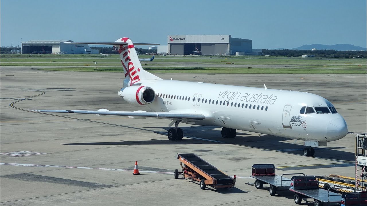 With Virgin Fokker 100 from Brisbane to Rockhampton - BUMPY LANDING !!! VH-FNC