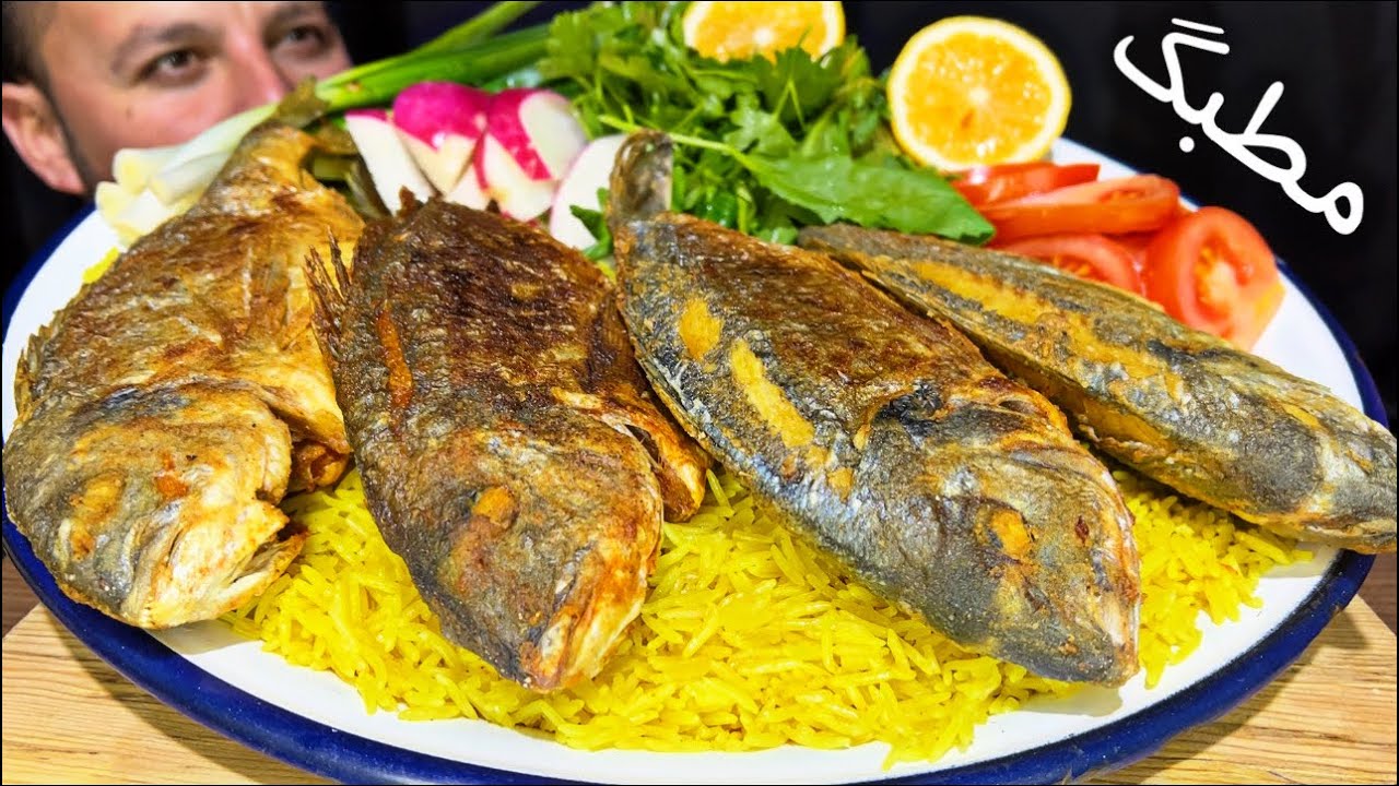 مطبگ سمك البصراوي مع رز اصفر و المقبلات اكلة عراقية مشهوره