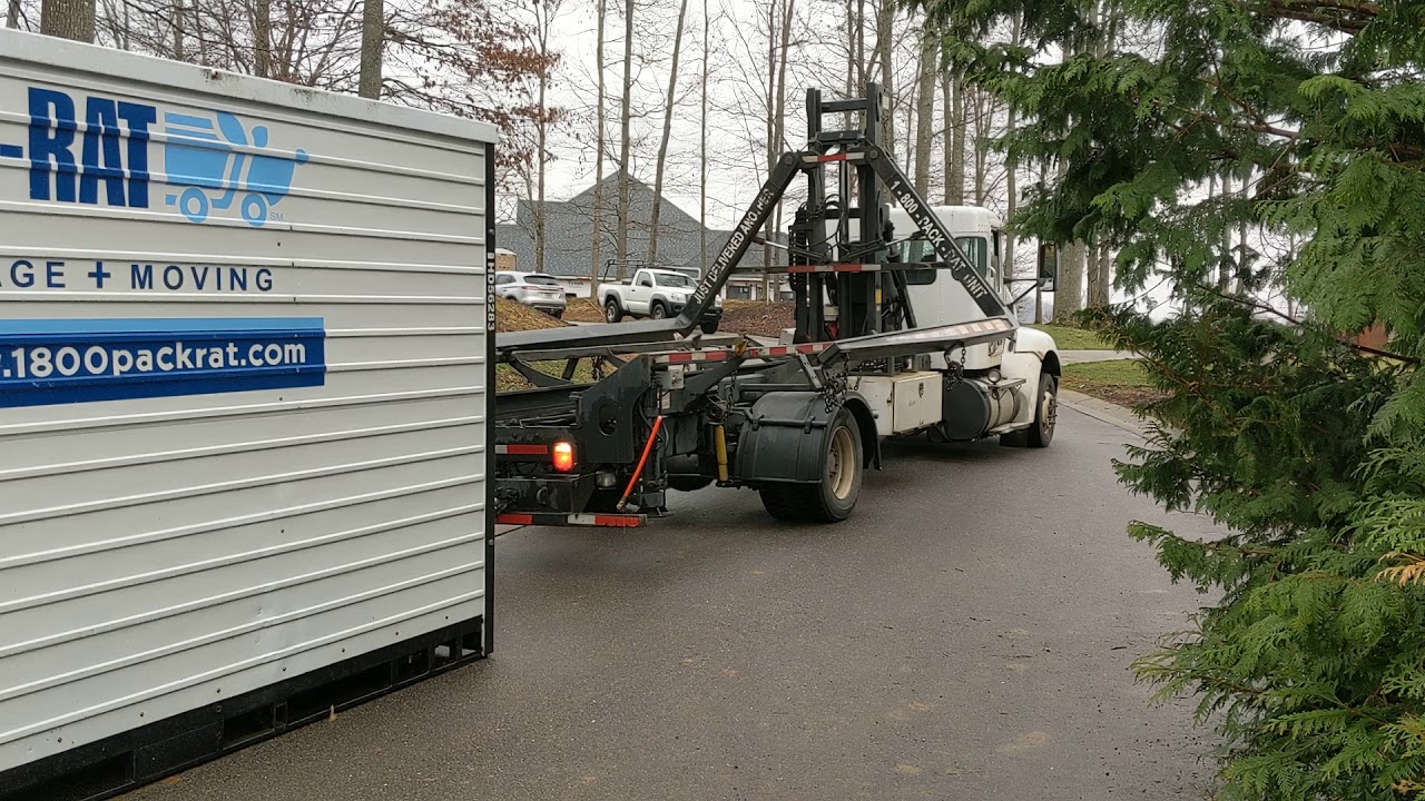 Asheville Movers Unloading 1-800-PACK-RAT Loading Portable Storage Container Fairview, NC