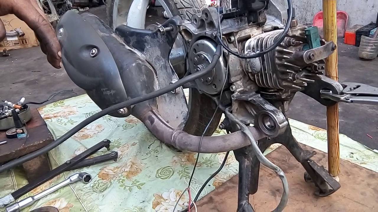 Scooter scarabeo 2t injection changée carburateur