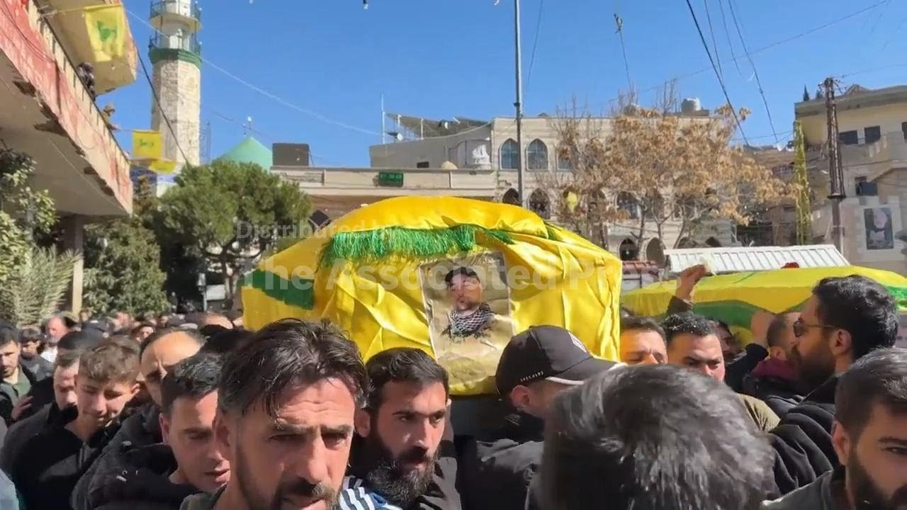 Thousands attend funerals of three Hezbollah members killed in Israeli strikes on eastern Lebanon