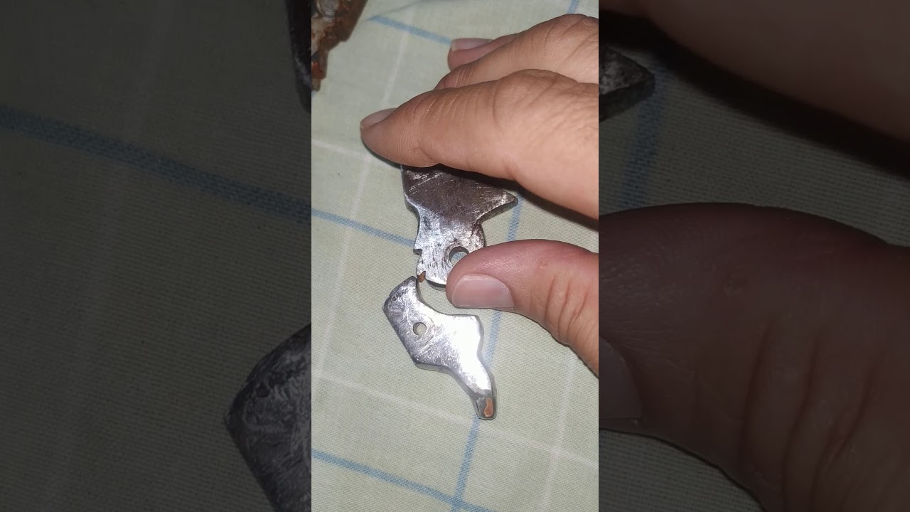 Continuação do cão e do gatilho cartucheira
