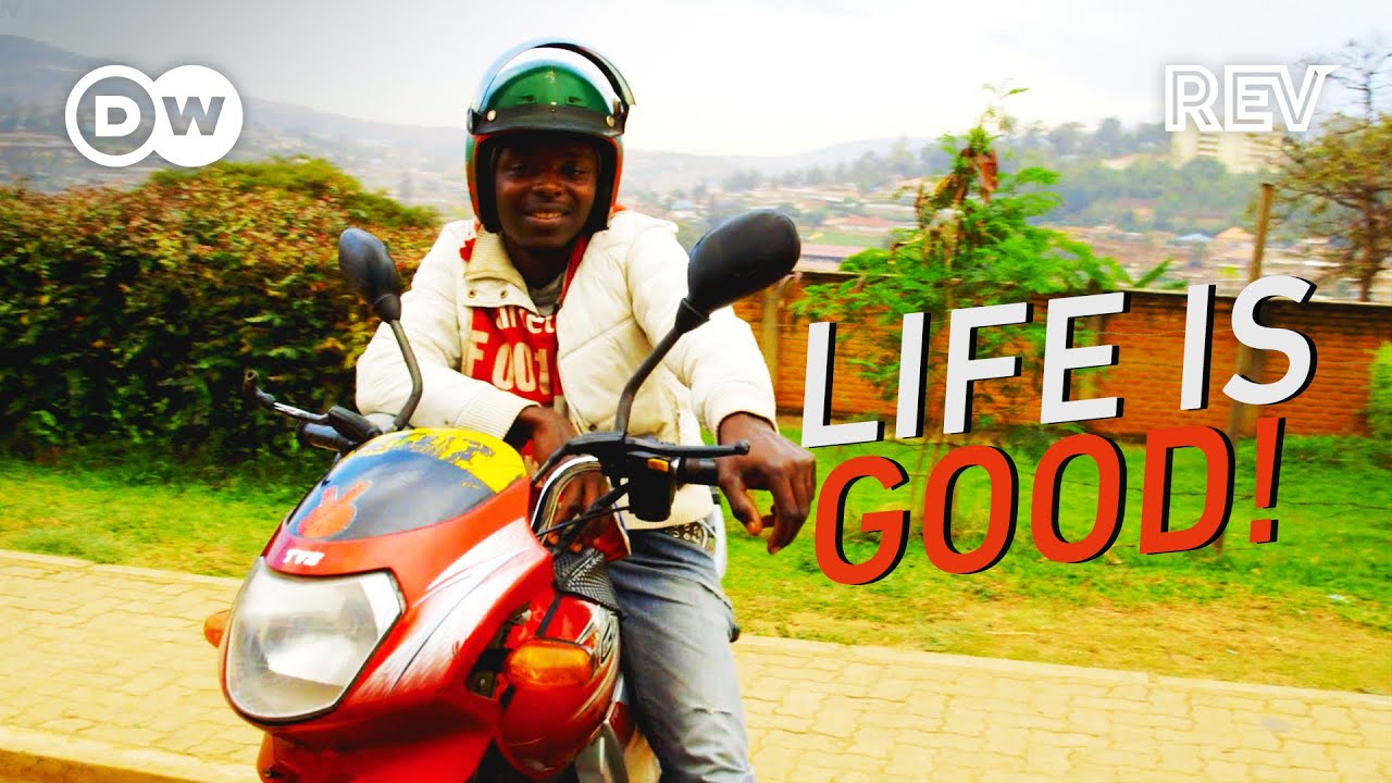 Riding in Rwanda: Motorcycle Taxi Driver in Kigali.