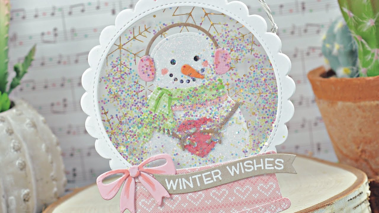 Snow globe shaker ornament with Kelly and Rebecca