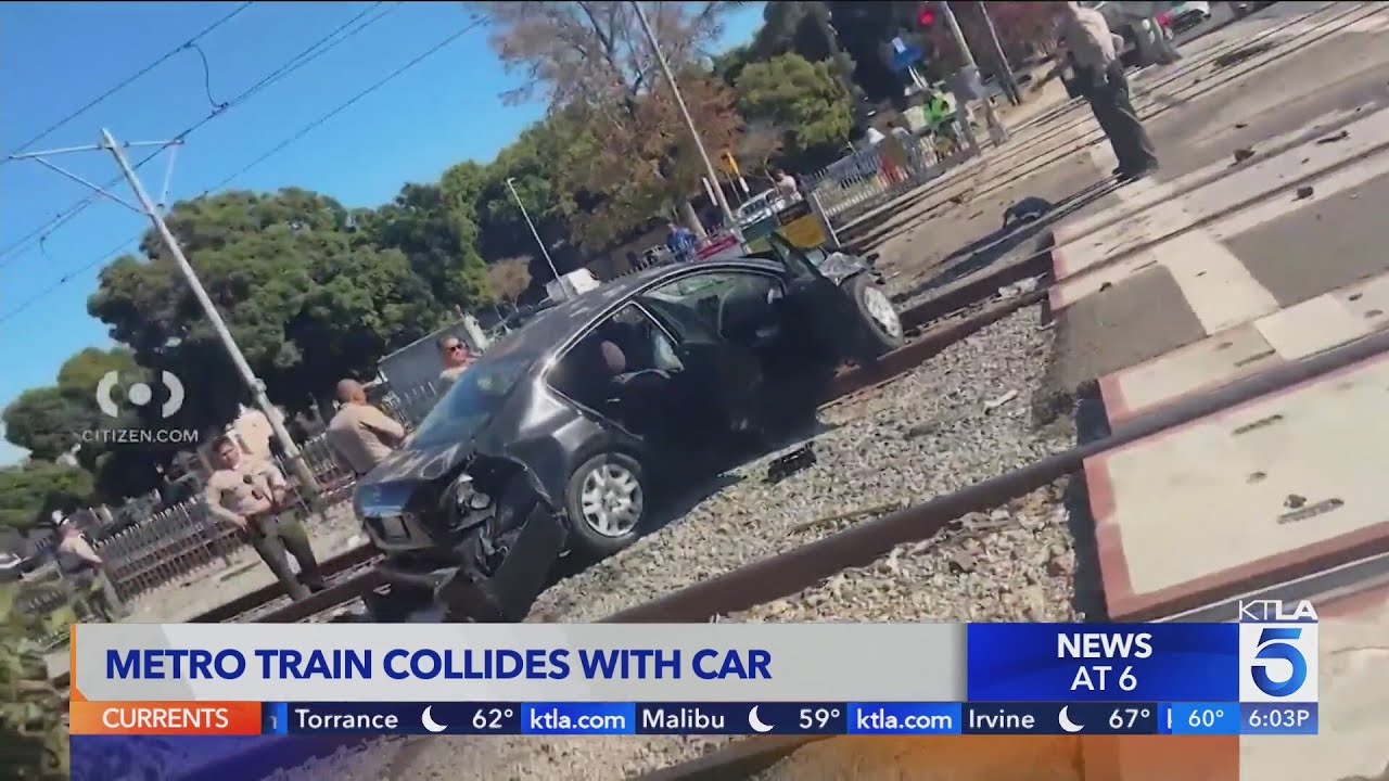 Driver hospitalized after car collides with Metro train in South L.A.