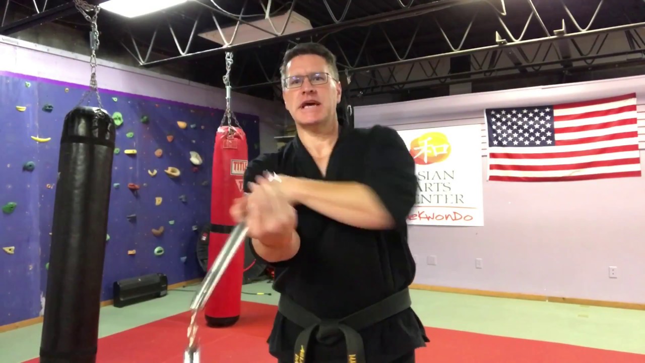 How To Spin Nunchucks And Do The Behind The Neck Hand Transfer