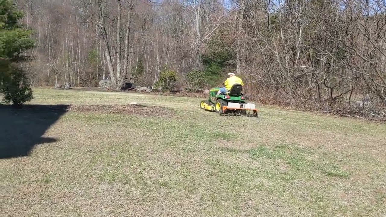 Tow behind aerator