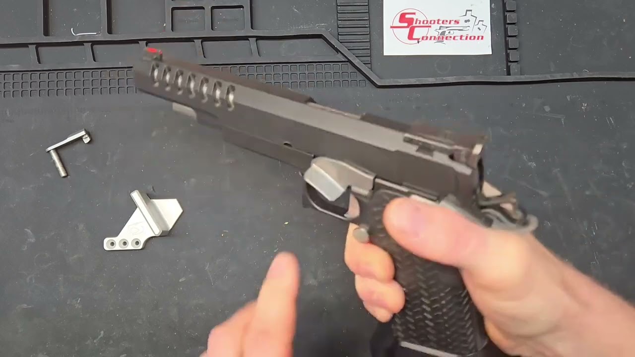 Slide Stop Thumb Rests on a 2011 Pistol
