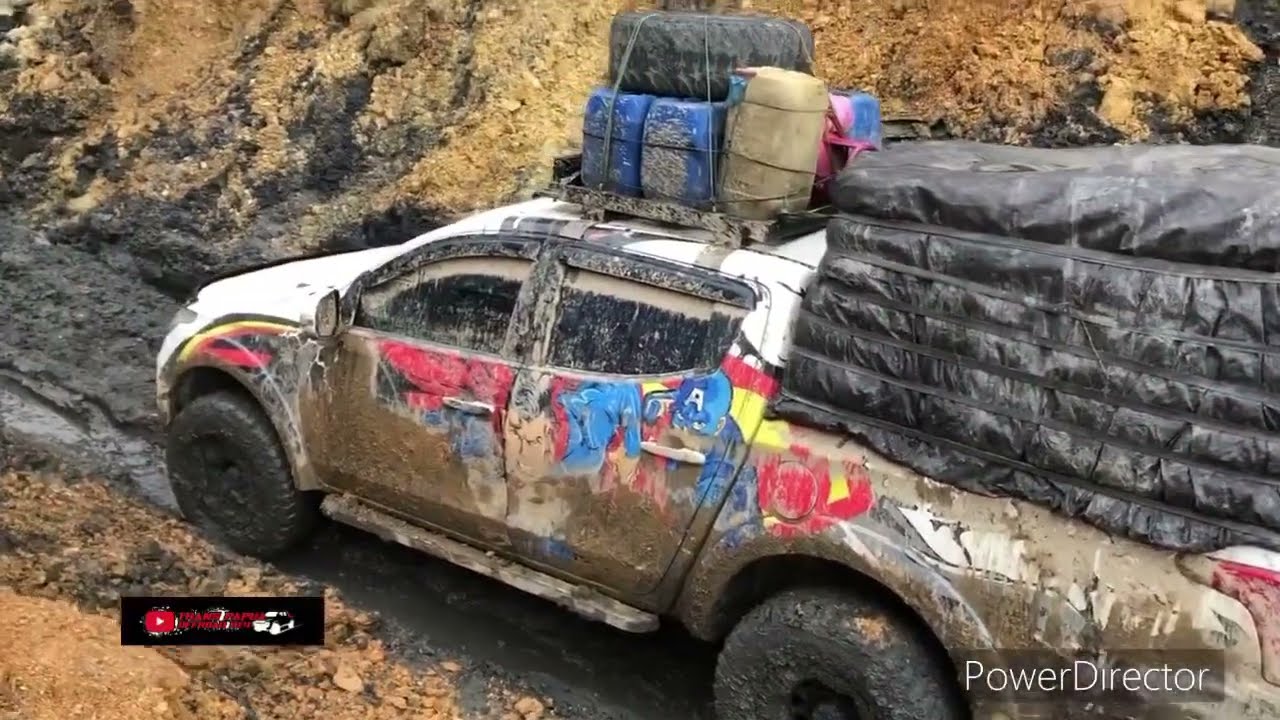 Terowongan jalan trans papua 2022||aksi mitsubishi triton 4x4 menerobos kubangan berlumpur😎