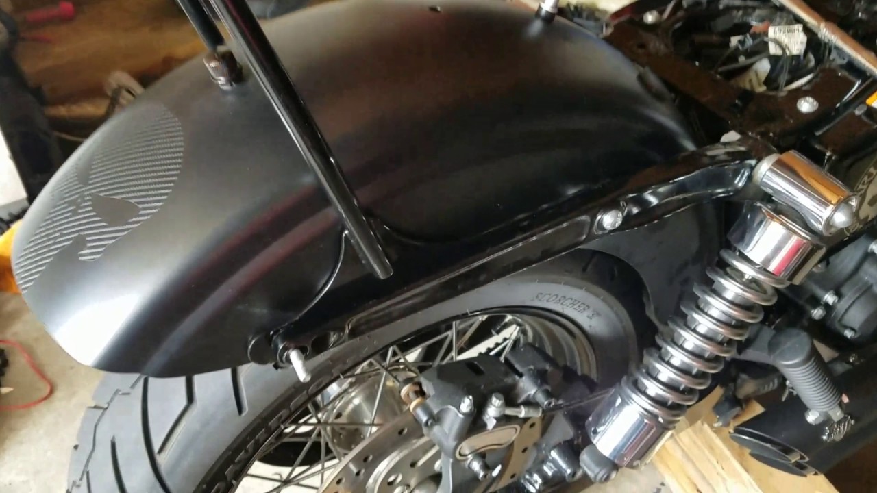 The Forge,  sissy bar installation on 14 Harley Davidson Street Bob.
