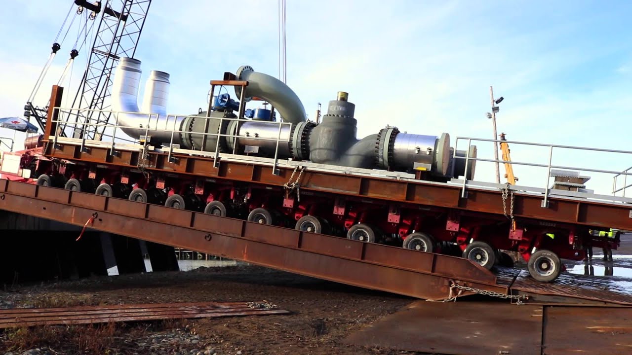 Loading a pipe module to a barge