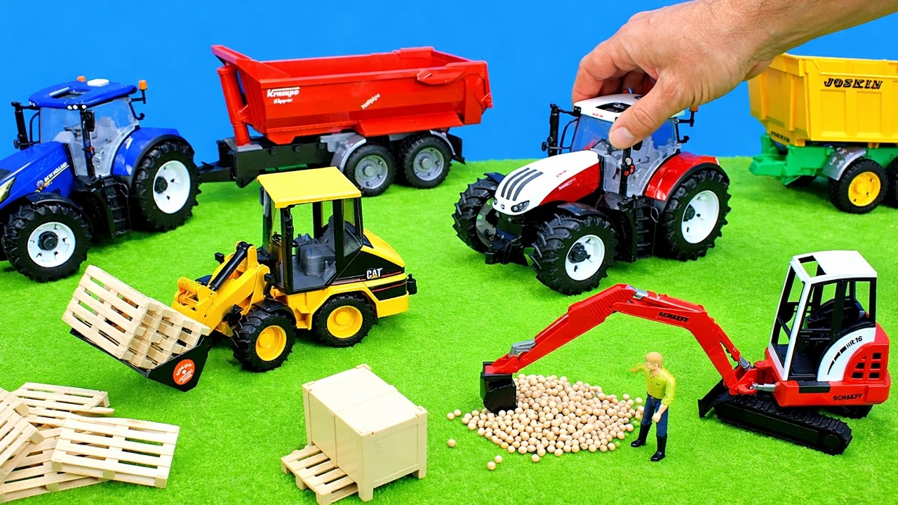 Farmer Spielzeuge von Bruder auspacken u. beim Spielen die Funktionen zeigen. Wir fahren den Traktor