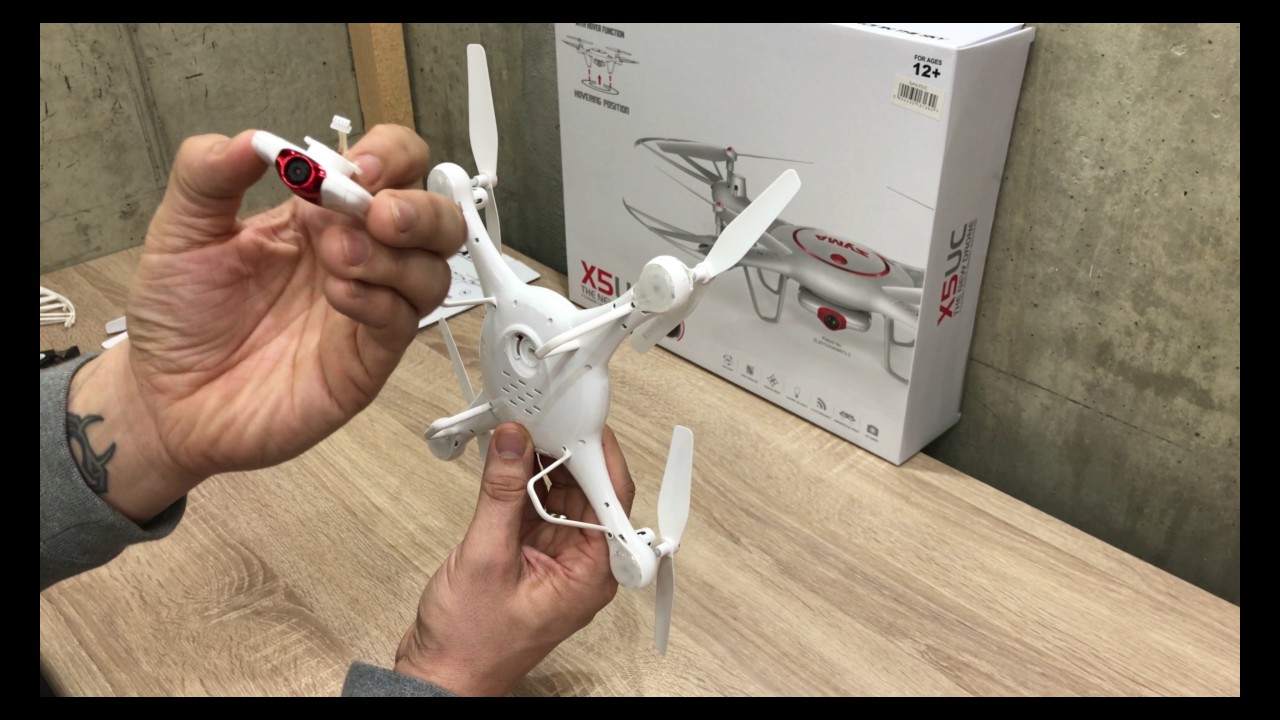 SYMA X5UC  - Unboxing - kamera 1MP, 2.4GHz, funkcja zawisu, zasięg do 70m, planowanie trasy.
