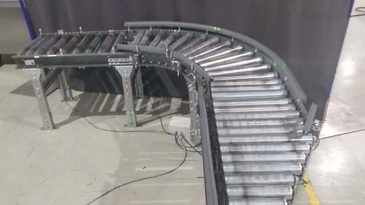 UNUSED Knapp Interroll motorized roller conveyor with 90 degree curve