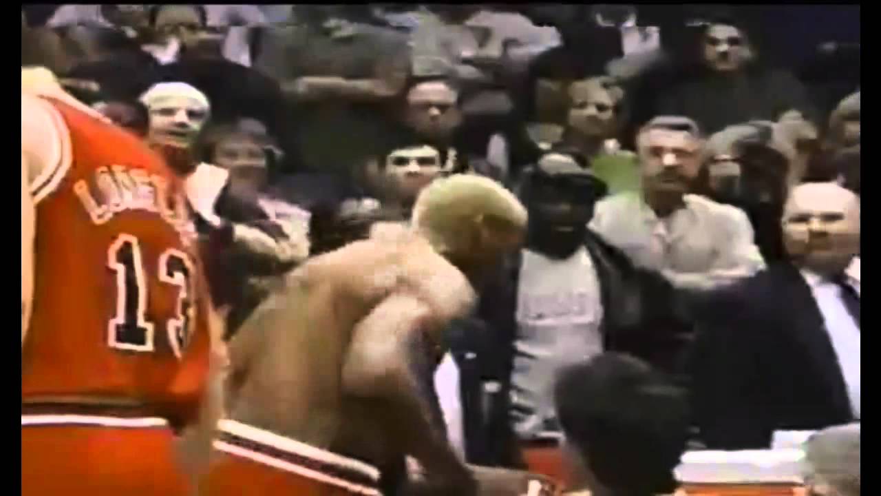 Dennis Rodman headbutts the referee.