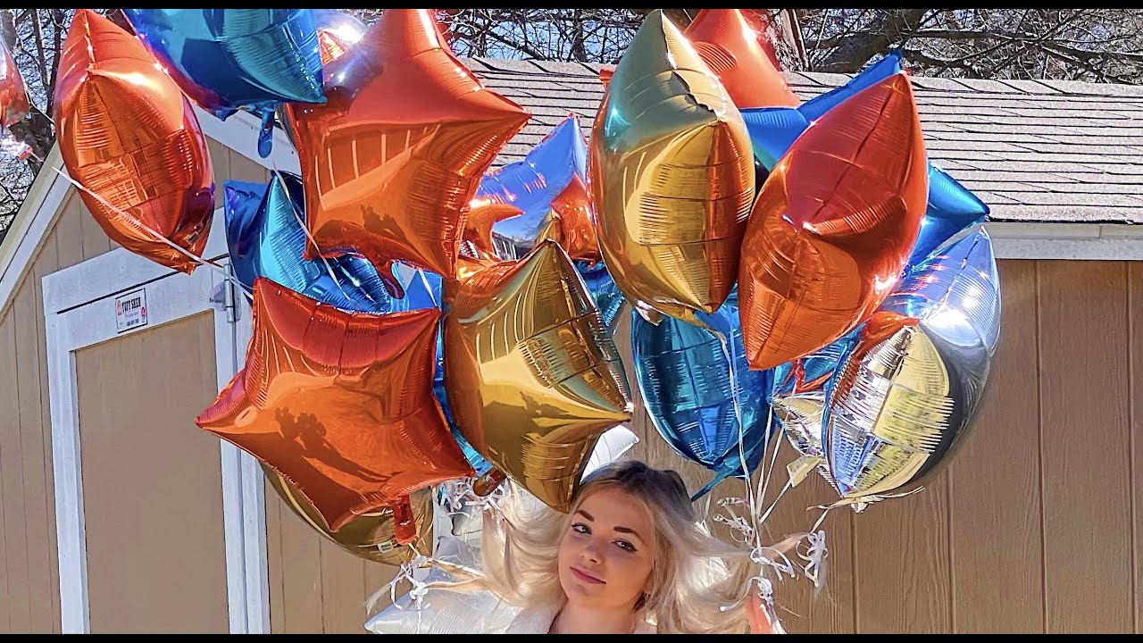 Tying An Absurd Amount of Balloons To My Hair