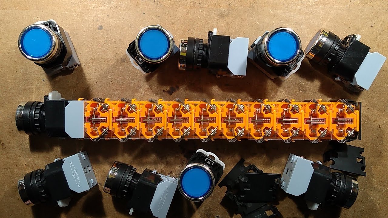 Stacking industrial switch contact blocks.  Actuation force test.